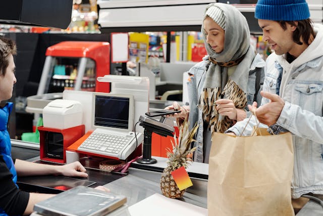 couple-buying-groceries-at-a-supermarket