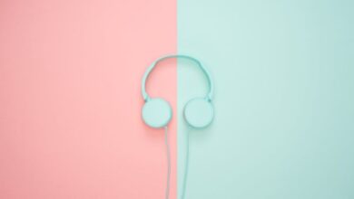 Headphones - Minimalist headphones on a pink and mint background, artistic and modern.