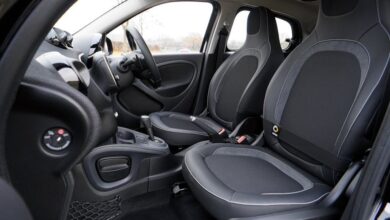 Car Seat - Explore the sleek interior of a modern luxury car featuring leather seats and advanced technology.