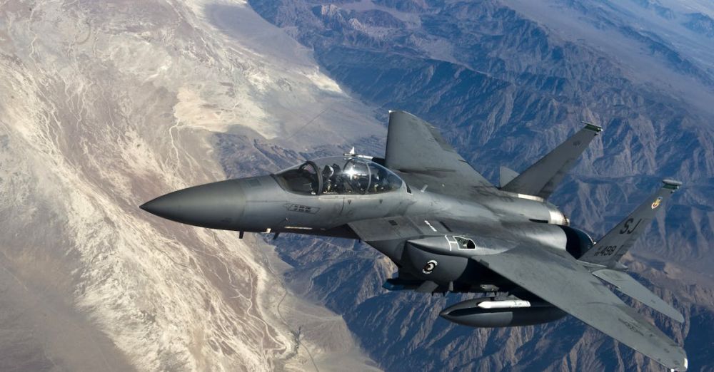 Radar Detectors - A military fighter jet flying above rugged mountain ranges, showcasing advanced aviation technology.