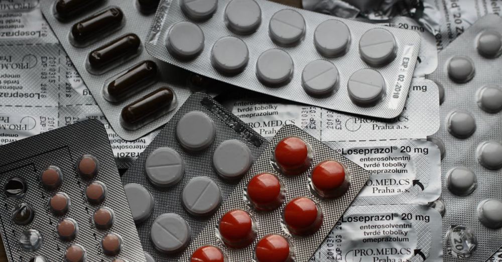 Tablets - Close-up of various pills in blister packs showcasing medical and healthcare themes.