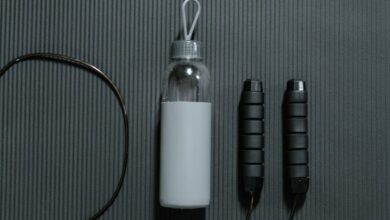 Home Gym Essentials - Flatlay of a water bottle and jump rope on a yoga mat, highlighting fitness essentials.