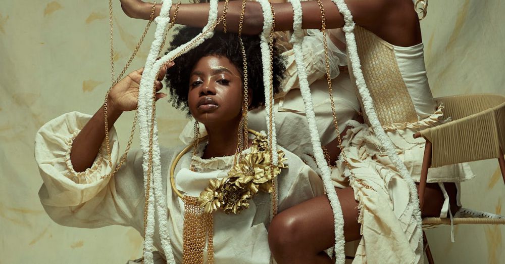 Statement Jewelry - A creative and artistic portrait of three women in stylish beige outfits and unique accessories.