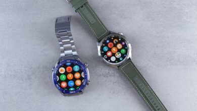 Smartwatches - Close-up of two smartwatches on a gray background highlighting design and technology.