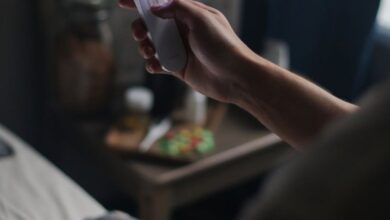 UV Devices - A UV sanitizer being used in a dimly lit bedroom for hygiene and disinfection.