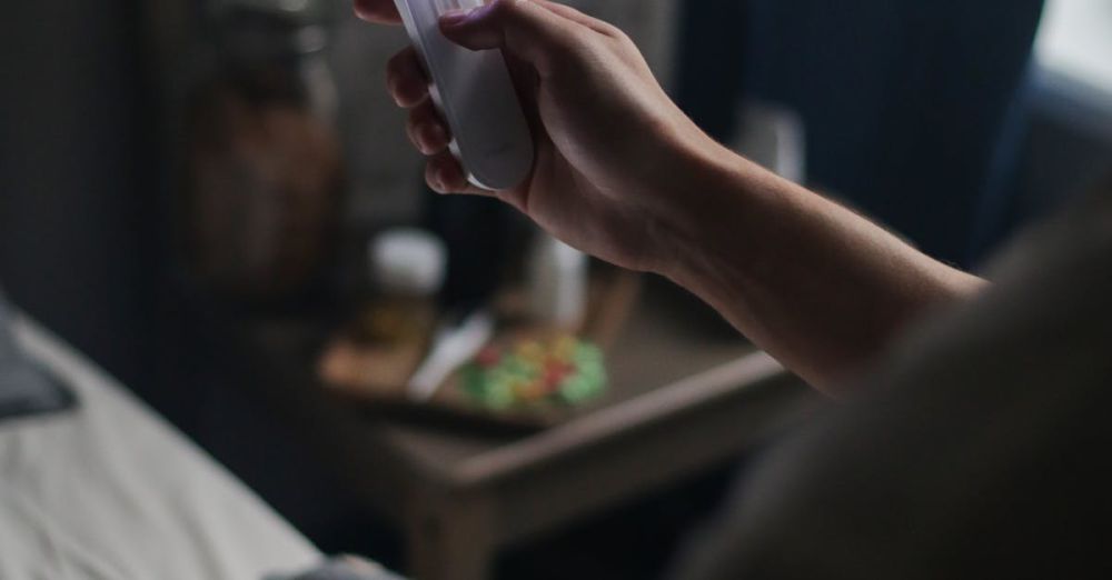 UV Devices - A UV sanitizer being used in a dimly lit bedroom for hygiene and disinfection.