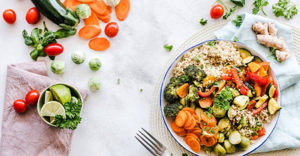 Food - Colorful quinoa salad with fresh vegetables creates a healthy, balanced meal.