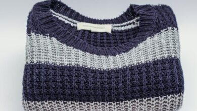 Sweaters - Warm knitted sweater with blue and white stripes, perfect for winter fashion.