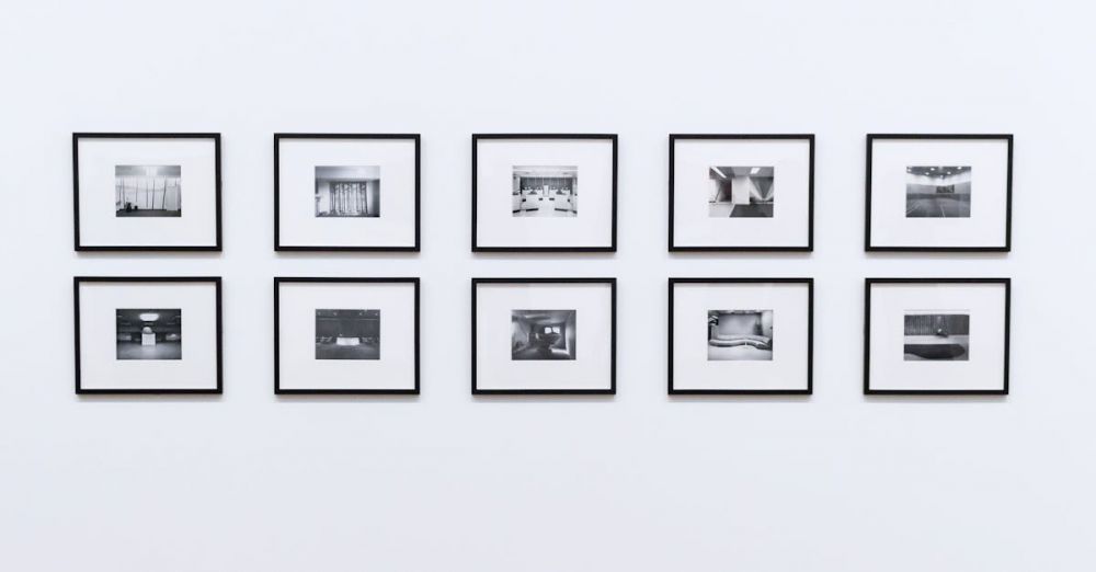 Picture Frames - Simple and elegant wall display with black and white framed photographs in a modern interior.