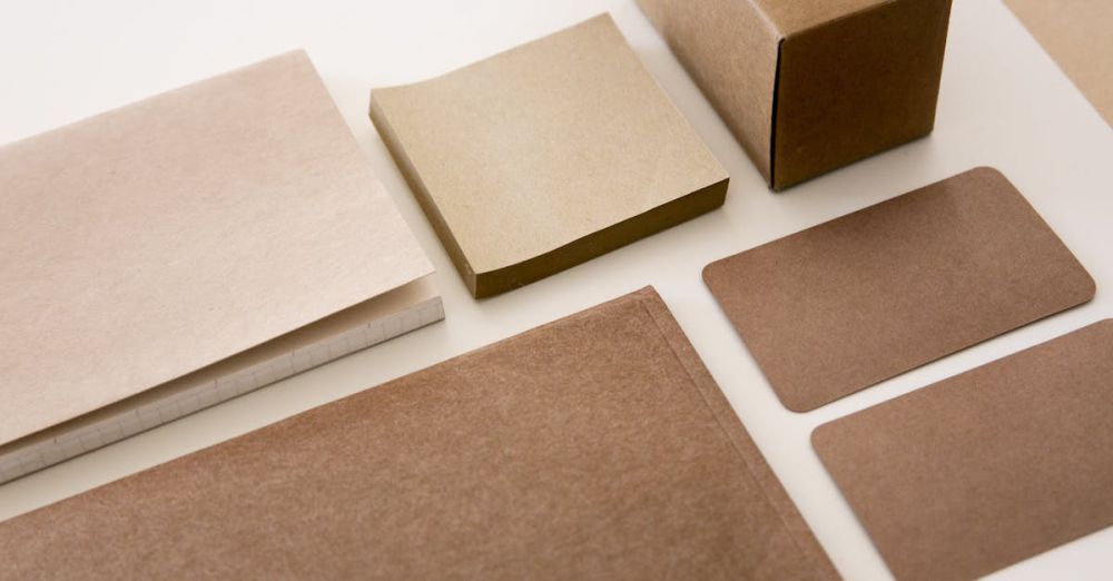 Paper Products - Explore a minimalist arrangement of brown paper stationery, perfect for office and business environments.