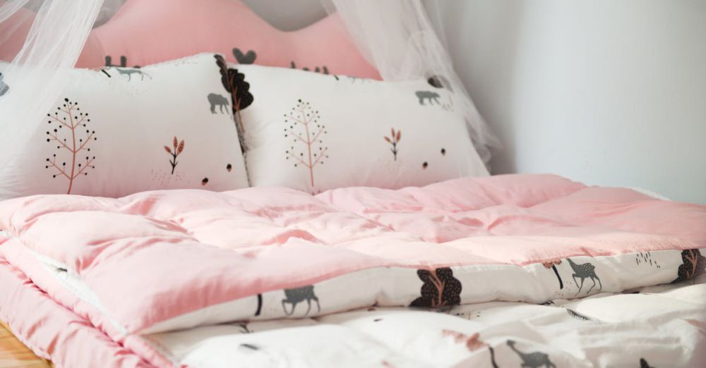 Bedding - A cozy bedroom with pink bedding and animal patterns, perfect for relaxation.