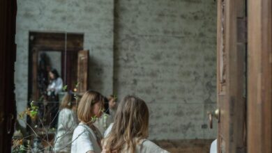 Body Pillows - Group of women engaged in spiritual ritual in serene indoor setting with candles.