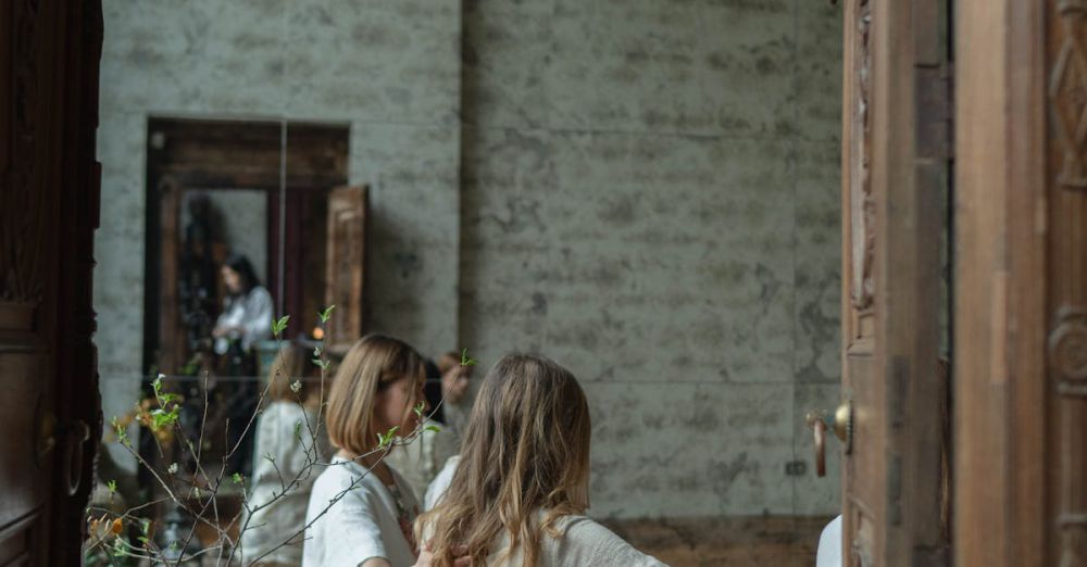 Body Pillows - Group of women engaged in spiritual ritual in serene indoor setting with candles.