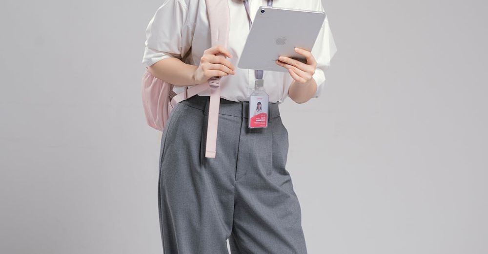 Tablet Stands - Confident young woman with headphones holding a tablet, ready for study or work.