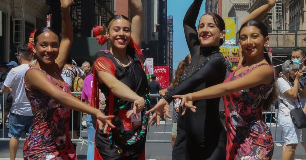 Music Subscriptions - Four dancers perform a lively flamenco routine on a bustling New York street during the day.