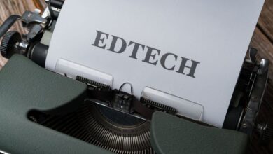 Learning Platforms - A classic typewriter with a sheet of paper displaying the word 'EDTECH.'