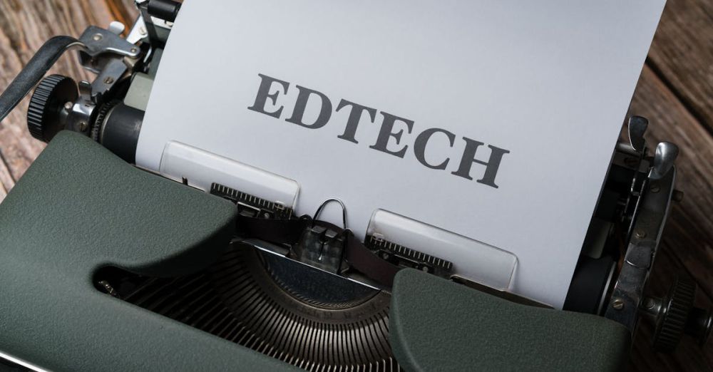 Learning Platforms - A classic typewriter with a sheet of paper displaying the word 'EDTECH.'