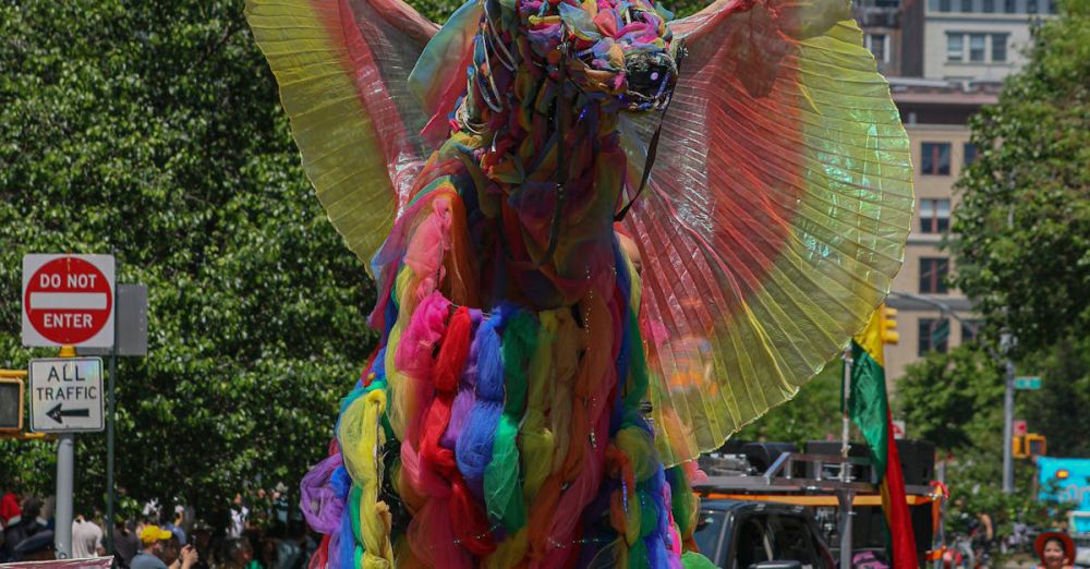 Creative Subscriptions - Colorful unicorn costume displayed at a festive New York City street parade event.