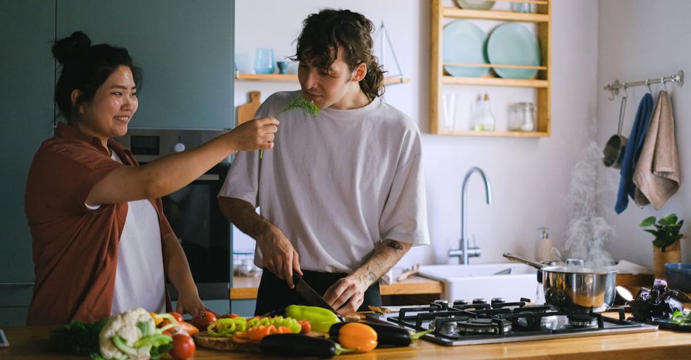 Cooking Subscriptions - Man in White Crew Neck T-shirt Holding Knife Slicing Vegetable