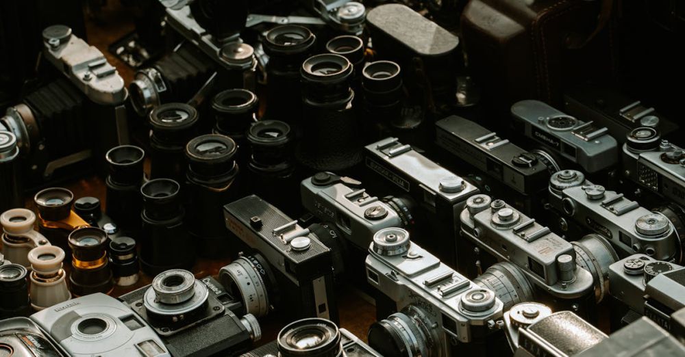 Camera Lenses - Collection of vintage cameras and accessories at a flea market stall in Sofia, Bulgaria.