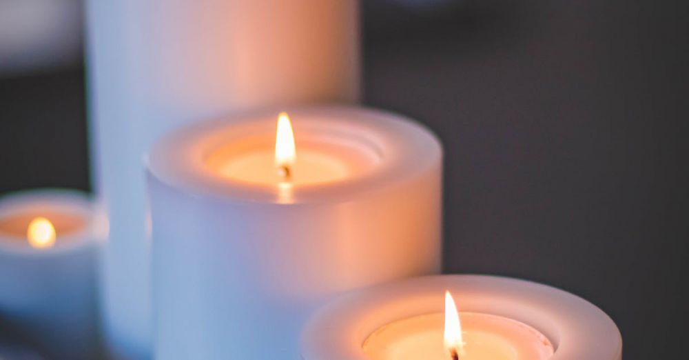 Candles - A close-up of a serene candlelight arrangement with a soft, soothing glow.