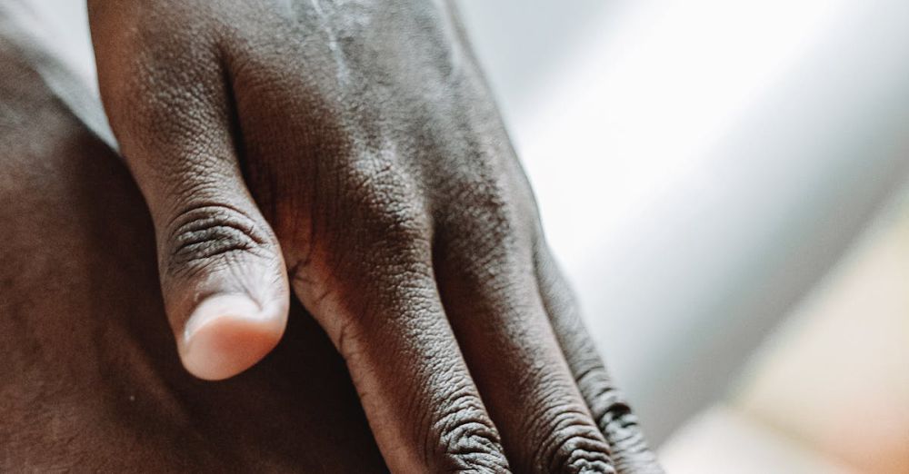 Foot Creams - Close-up image showing hands applying skincare cream to feet, highlighting self-care routine.