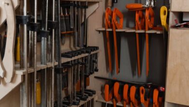 Power Saws - A tidy display of woodworking tools in a workshop, showcasing precise organization.