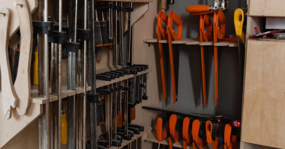 Power Saws - A tidy display of woodworking tools in a workshop, showcasing precise organization.