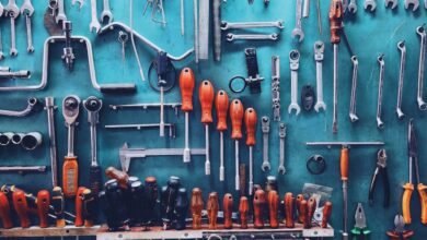 Screwdrivers - A neatly arranged collection of tools on a workshop wall, perfect for automotive or repair themes.