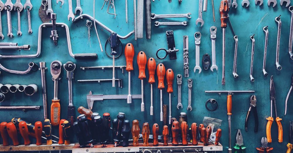 Screwdrivers - A neatly arranged collection of tools on a workshop wall, perfect for automotive or repair themes.