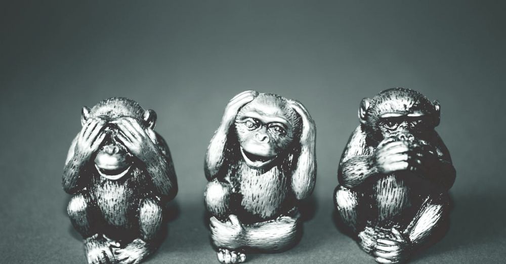 Figurines - Black and white photo of three wise monkeys figurines showing the hear no evil, see no evil, speak no evil poses.