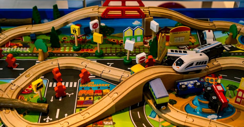 Model Trains - Vibrant and detailed wooden toy train set with roads, bridges, and signs for imaginative play.