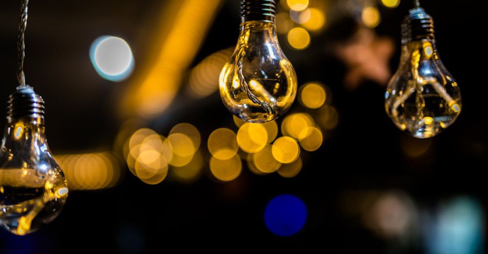 Bulbs - Artistic shot of hanging light bulbs with a beautiful bokeh background effect.