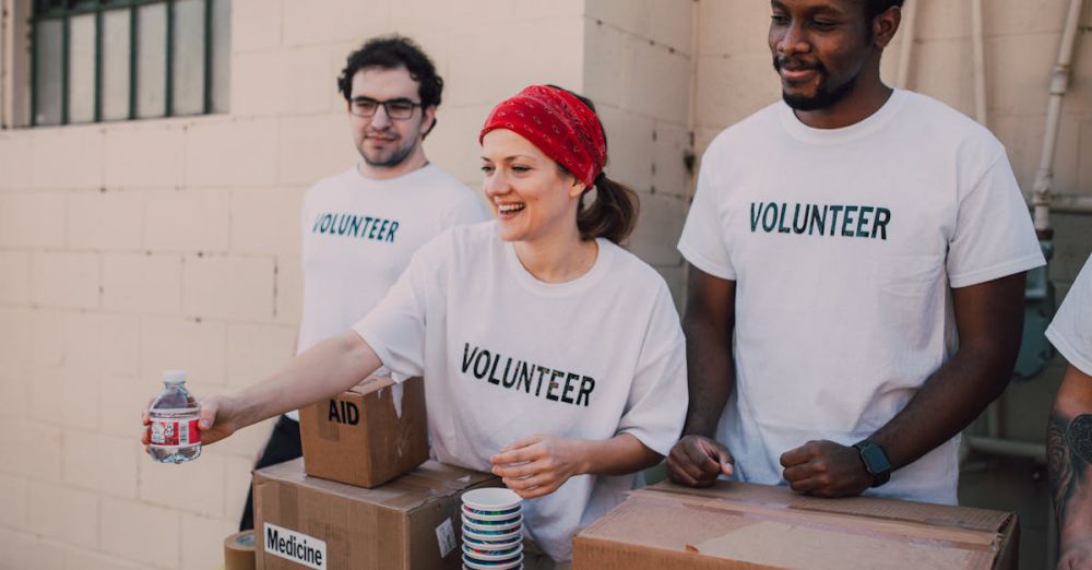 Causes - Volunteers distributing aid at an outdoor donation center, promoting social impact and diversity.