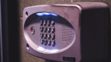 Doorbell - A close-up image of an illuminated security keypad mounted on a wall.