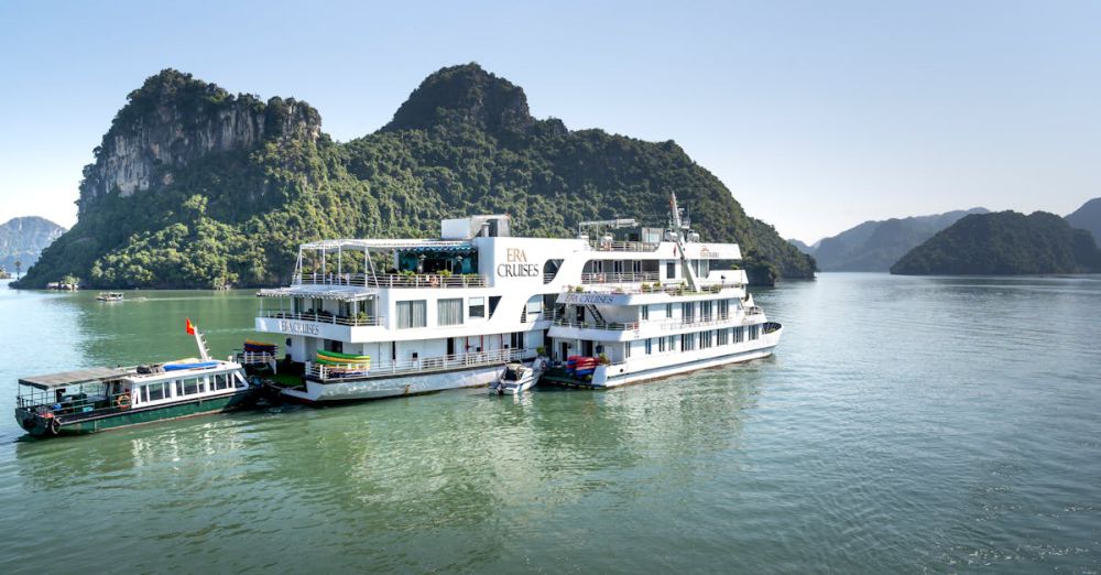 Tour Companies - Explore the serene beauty of Halong Bay with a cruise through lush islands.