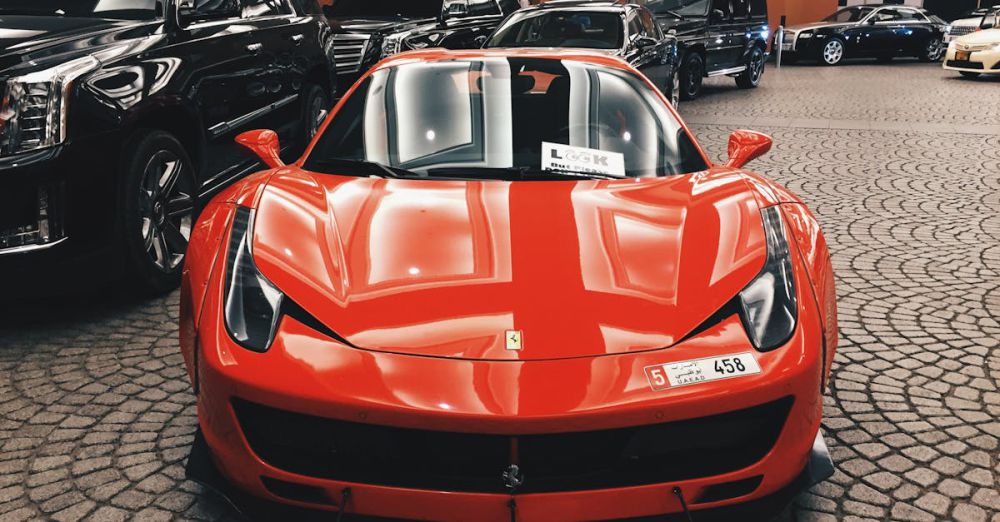 Expensive - Red Ferrari sports car showcased at Dubai Mall, UAE, symbolizing luxury and elegance.