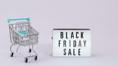 Deals - Minimalist image of shopping cart and Black Friday sale sign, perfect for retail promotions.