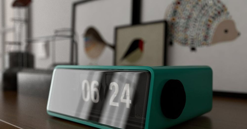 Alarms - A sleek digital clock displaying 06:24 on a stylish wooden surface indoors.