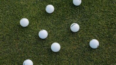 Multiple Parks - A visually appealing composition of scattered white golf balls on a lush green grass field.