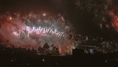 Iconic Festivals - Fireworks display lighting up the night sky over Sydney Opera House.