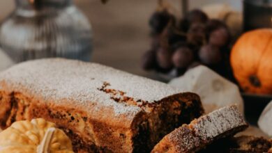 Gourmet Festivals - A loaf of bread with pumpkins and other fall decorations