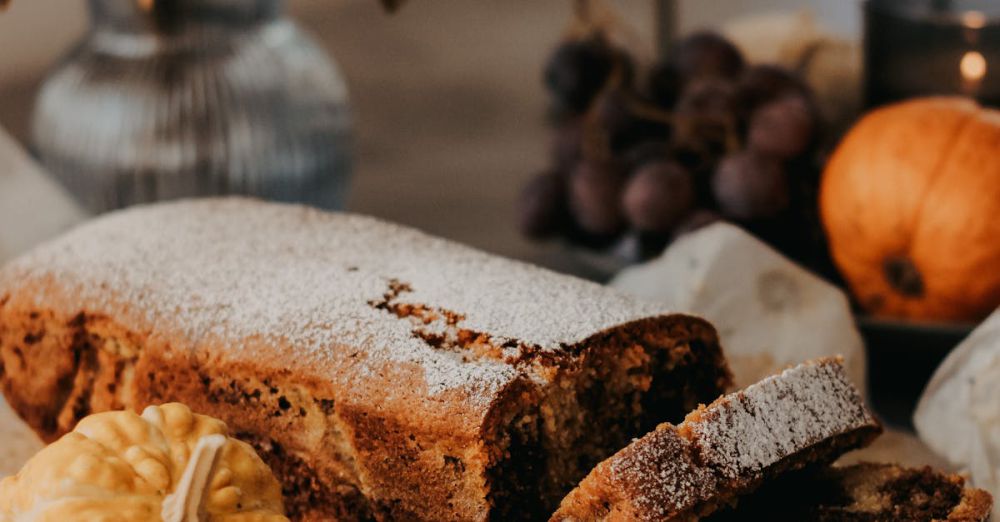 Gourmet Festivals - A loaf of bread with pumpkins and other fall decorations