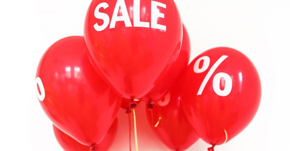 Budget Festivals - Bright red balloons with 'SALE' and '%' symbols, perfect for marketing promotions.