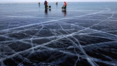 Ice Fishing - Explore a winter wonderland on the frozen surface of Lake Baikal, Russia.