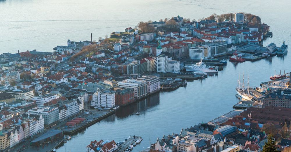 Fishing Destinations - A breathtaking aerial shot of Bergen, Norway, showcasing the harbor and cityscape with boats and waterfront buildings.