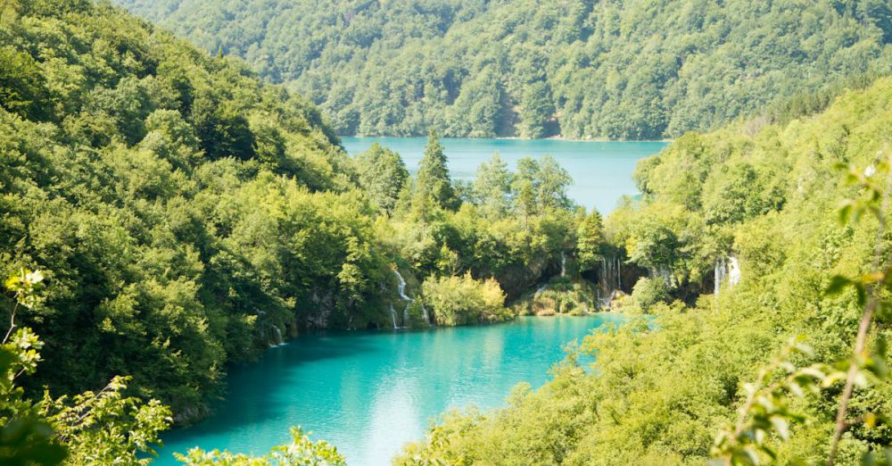 Lakes - Breathtaking landscape of Plitvice Lakes with lush forests and turquoise waters.