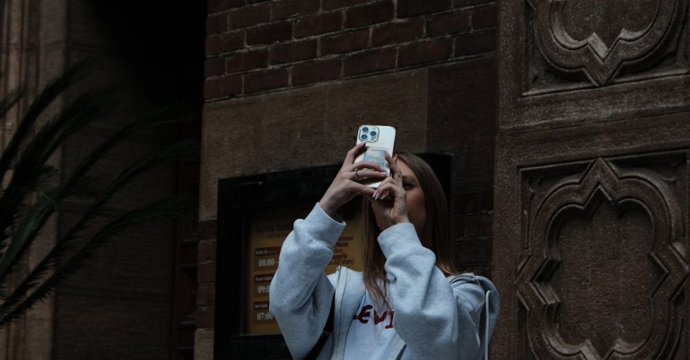 City Safari - Young woman capturing moments on her phone in an urban setting.