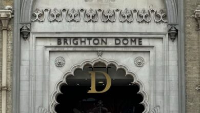 Cultural Events - Elegant Gothic-style entrance of Brighton Dome with intricate carvings.