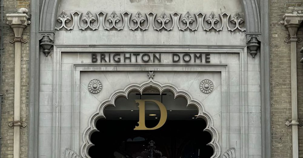 Cultural Events - Elegant Gothic-style entrance of Brighton Dome with intricate carvings.